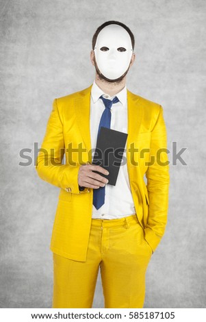 mysterious politician wearing a mask, holding an envelope with a bribe in hand