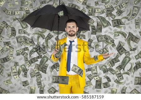 young businessman is very rich, money rain