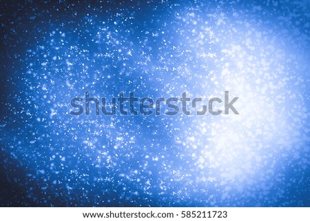 Abstract blue round  bokeh or glitter lights background. Circles and defocused particles