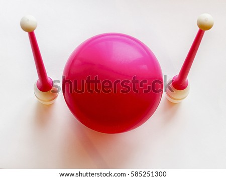 Ball and clubs for gymnastics Royalty-Free Stock Photo #585251300