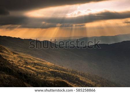 A beautiful sun rays with clouds in the morning used as for background