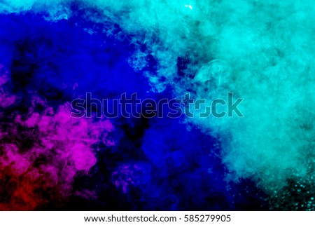 Color smoke on black background