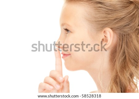 bright picture of pretty girl with finger on lips