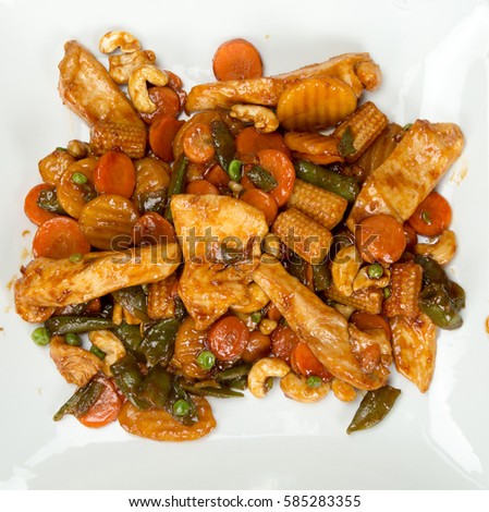 Healthy food, chicken with vegetables and sauce. horizontal picture of a white background