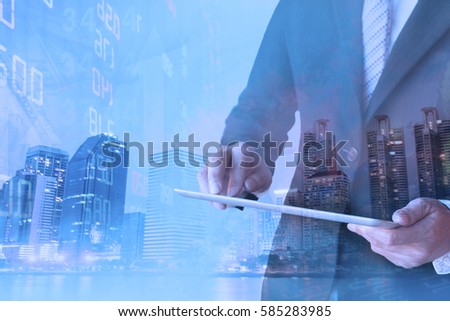 Double Exposure businessman with modern visual Technology for trading to sell in stock Market with index graph and indicator background.