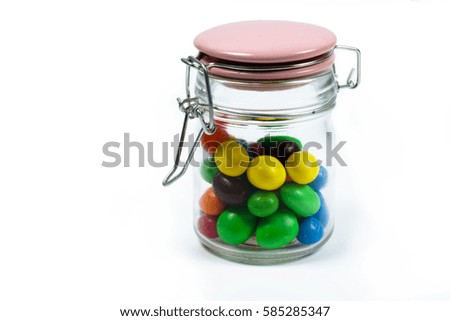candy in jars isolated white background