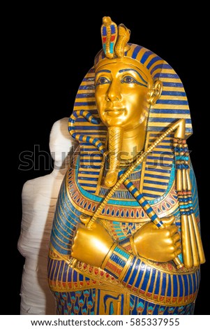 mummy replica statue in sarcophagus. Painted in the original colors.