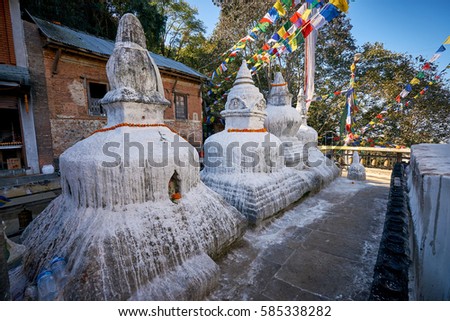 White stupas in Thrangu Tashi Yangtse Monastery (Namo Buddha) in Nepal Royalty-Free Stock Photo #585338282