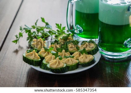 St Patrick day party - green beer and appetizers, copy space