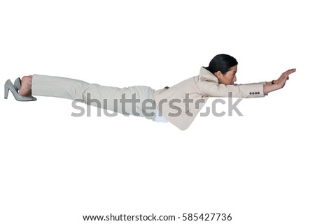 Businesswoman performing exercise against white background