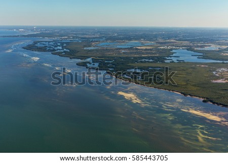 Aerial view of city and gulf Bradenton, Florida. Approach to land at the airport in St. Petersburg. Manatee River, Florida