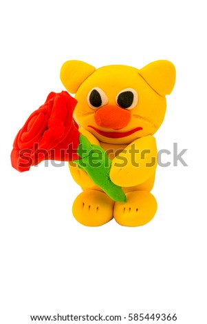 Plasticine Yellow bear and pink rose on white isolated background