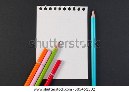 Close-up of business note paper. Template for blank note paper with colorful pencil for text and note. Top view