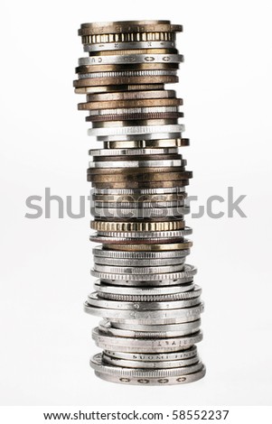 Tower combined from coins on a white background Royalty-Free Stock Photo #58552237