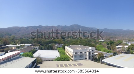 City and mountains panorama