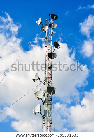 communication antenna tower with blue sky.