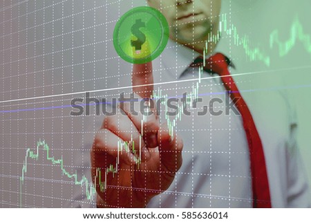 businessman makes pressing the green button with the image of success dollar symbol chart success in the rapidly growing profits / business success 