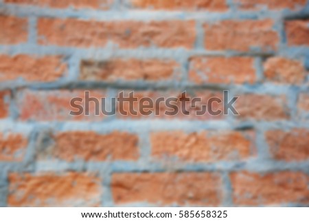 orange brick wall for background or wallpaper , Blur Image.