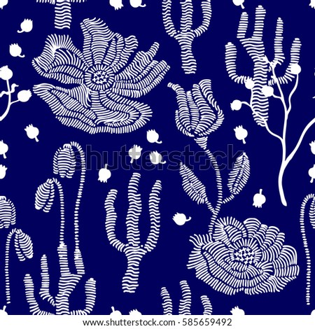Spring colors. Floral seamless vector pattern with embroidery wildflowers and grass. Stylized hand drawn elements. 1950s-1960s motifs. Retro textile design collection. White on dark blue.