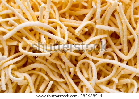 Pasta texture background. Pasta is a staple food of traditional Italian cuisine.
