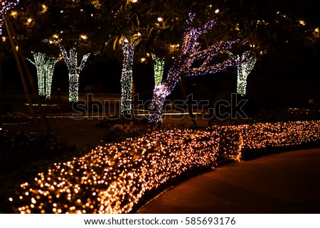 Park at night and the light, beautiful.Night city street lights  background,Lights blurred Royalty-Free Stock Photo #585693176
