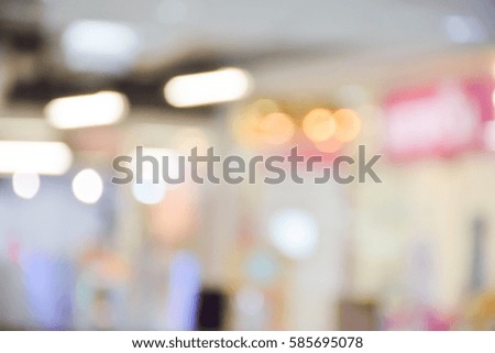 Blurred inside shopping mall background with bokeh.