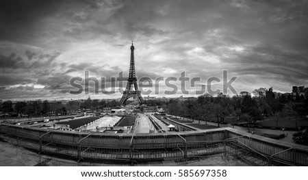 Beautiful panoramic cityscape. Dramatic cloudscape. View of the Eiffel Tower from the Trocadero. B&W photography. France. Paris.