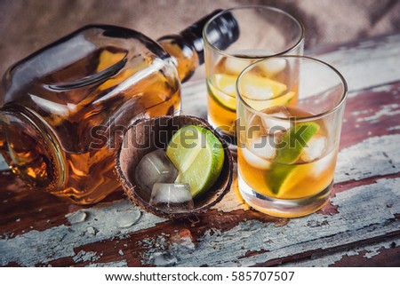 Rum with lime and ice in the hold of a pirate ship