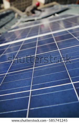  Solar photovoltaic roof. installing alternative energy photo.voltaic solar panels on roof.