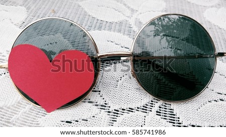 red heart on sunglasses