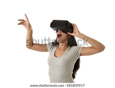 young attractive happy woman excited using 3d goggles watching 360 virtual reality vision enjoying cyber fun experience in vr simulation reality and new gaming technology isolated white background