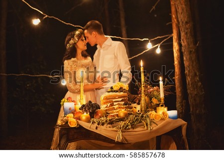 wedding love story. night photo in the forest 