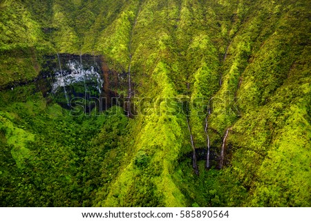 Mount Waialeale known as the wettest spot on Earth, Kauai, Hawaii  Royalty-Free Stock Photo #585890564