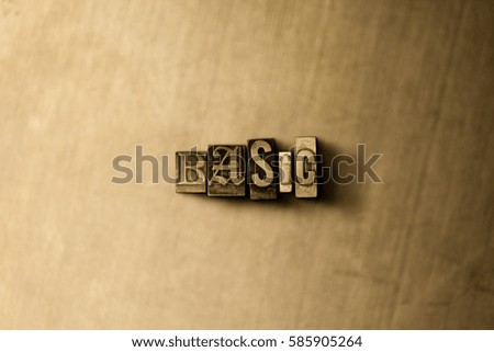 BASIC - close-up of grungy vintage typeset word on metal backdrop. Royalty free stock illustration.  Can be used for online banner ads and direct mail.