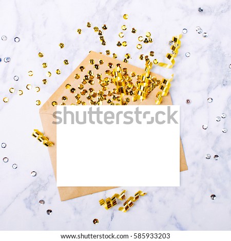 Photo frame or gift card with golden serpentines. Mockup template. View from above