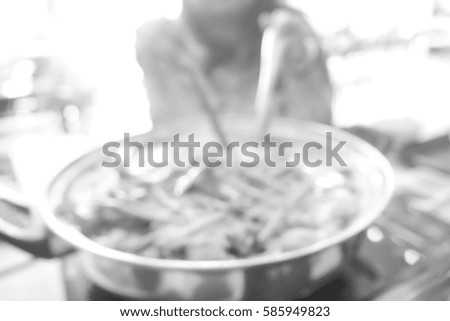 Picture blurred  for background abstract and can be illustration to article of people eat sukiyaki in restaurant