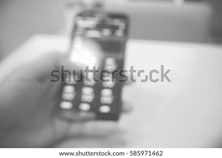 Picture blurred  for background abstract and can be illustration to article of hand use mobile phone