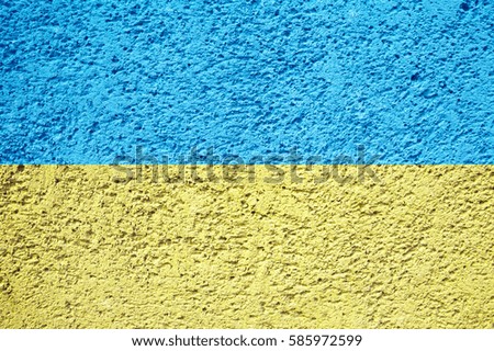 Flag of Ukraine. Spray painted graffiti grunge stone wall. Courage concept. Ukrainian national colors background. 
