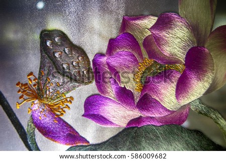Vietnamese Lotus flower silk embroidery as a main element of the traditional Vietnamese embroidery pictures 