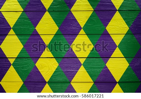 Diamond green, purple, yellow pattern painted Mardi Gras holiday background. Invitation, postcard, greeting card banner template.