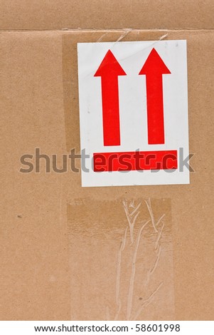 "This side up"-sign on corrugated cardboard carton