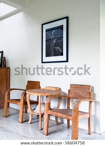 wood armchair in white home interior