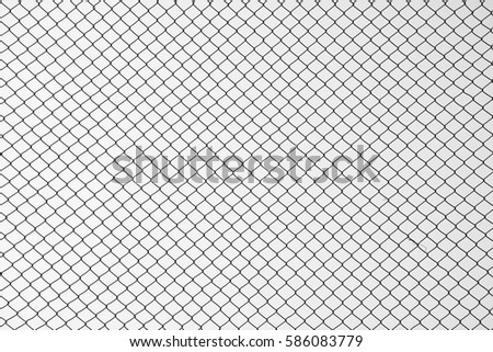 cage metal wire on pale grey background