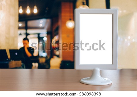 Label the blank menu frame on  a table in the restaurant is suitable for inserting the text of the customer.