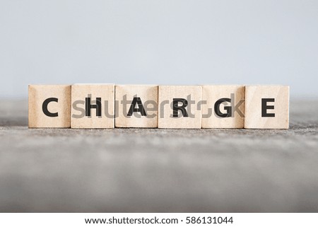 CHARGE word made with building blocks
