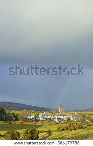 A partial rainbow over the Minions and the Prince of Wales Engine house, also known as the Phoenix United Mine, Bodmin Moor, Cornwall, United Kingdom