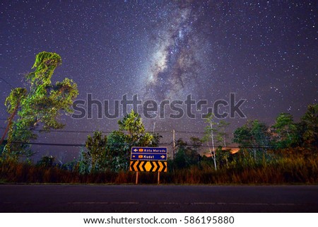 beautiful milkyway on a night sky long exposure photograph with grain