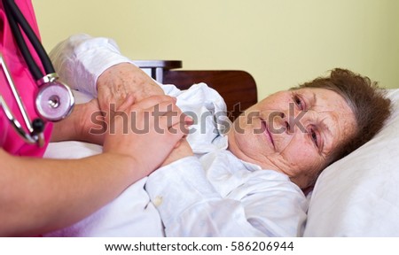 Picture of a bedridden elderly woman at home