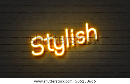 Stylish neon sign on brick wall background
