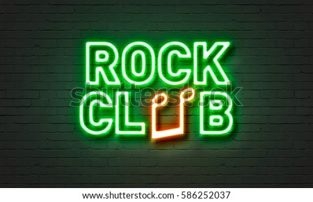 Rock club neon sign on brick wall background